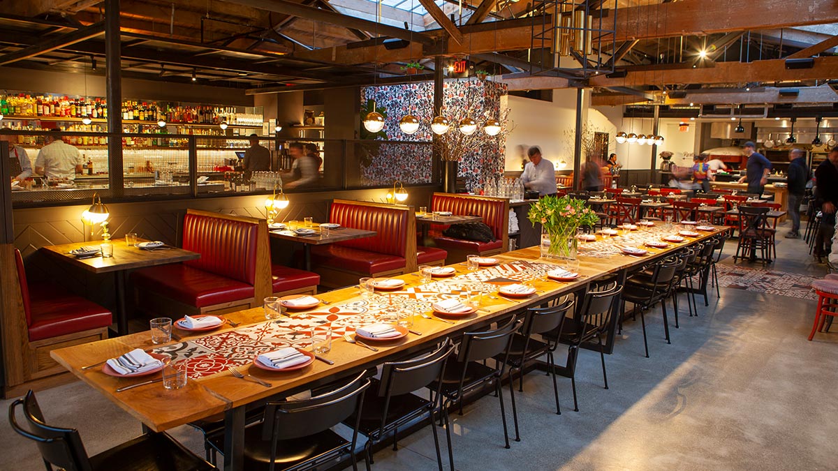 An interior shot of the dining room at Che Fico in San Francisco.
